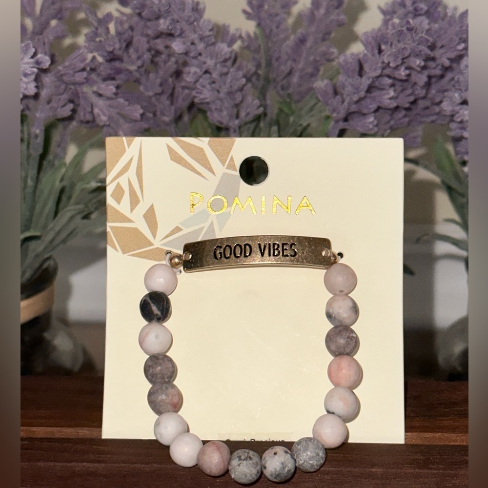 "Good Vibes" engraved, beaded stretched bracelet.
